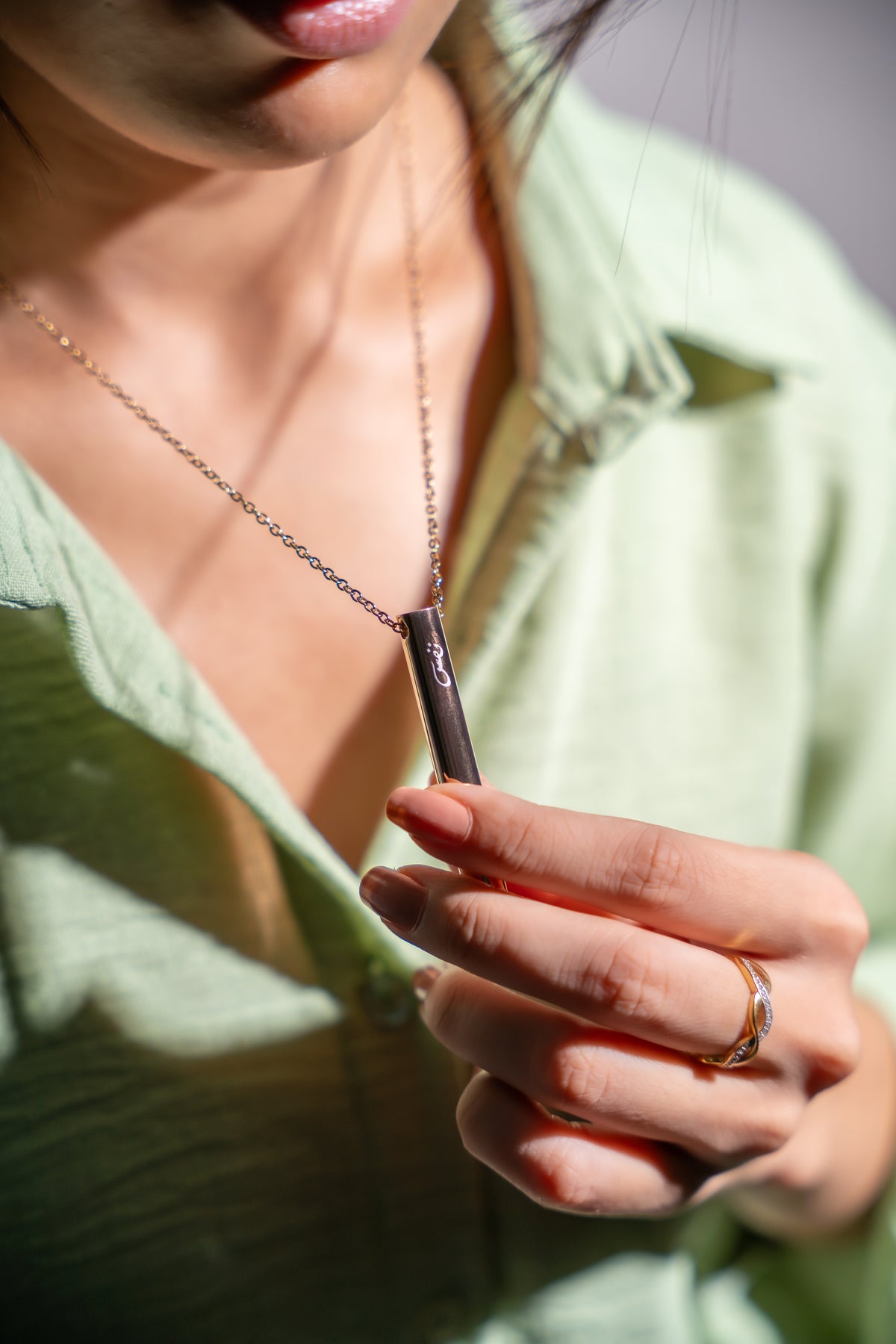 NAFAS silver breathing necklace lifestyle close-up